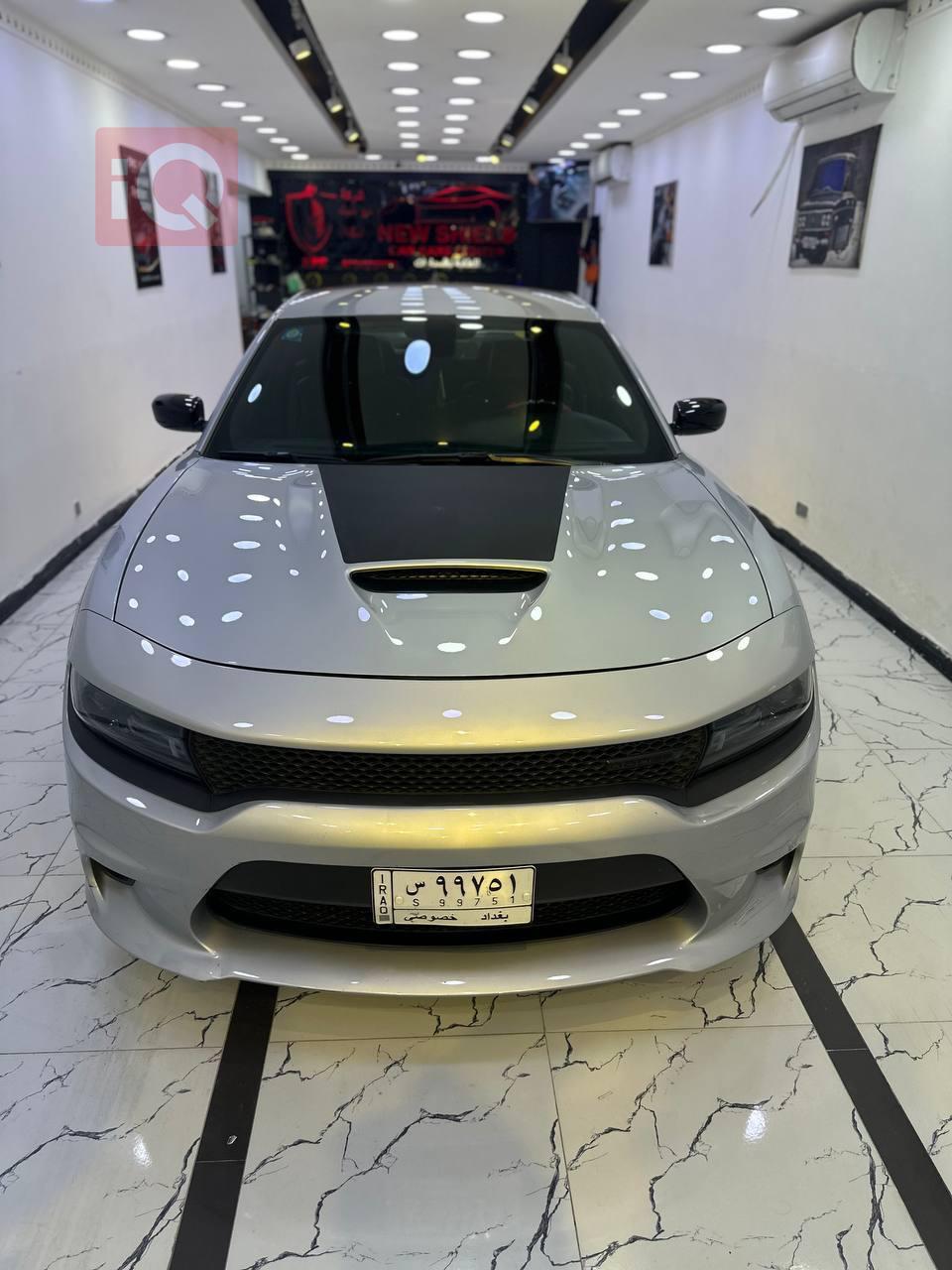 دۆج چارجەر